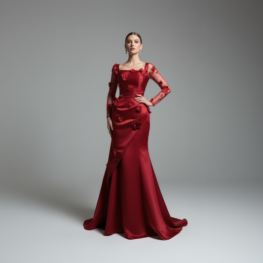 Red evening gown with floral details on a gray background