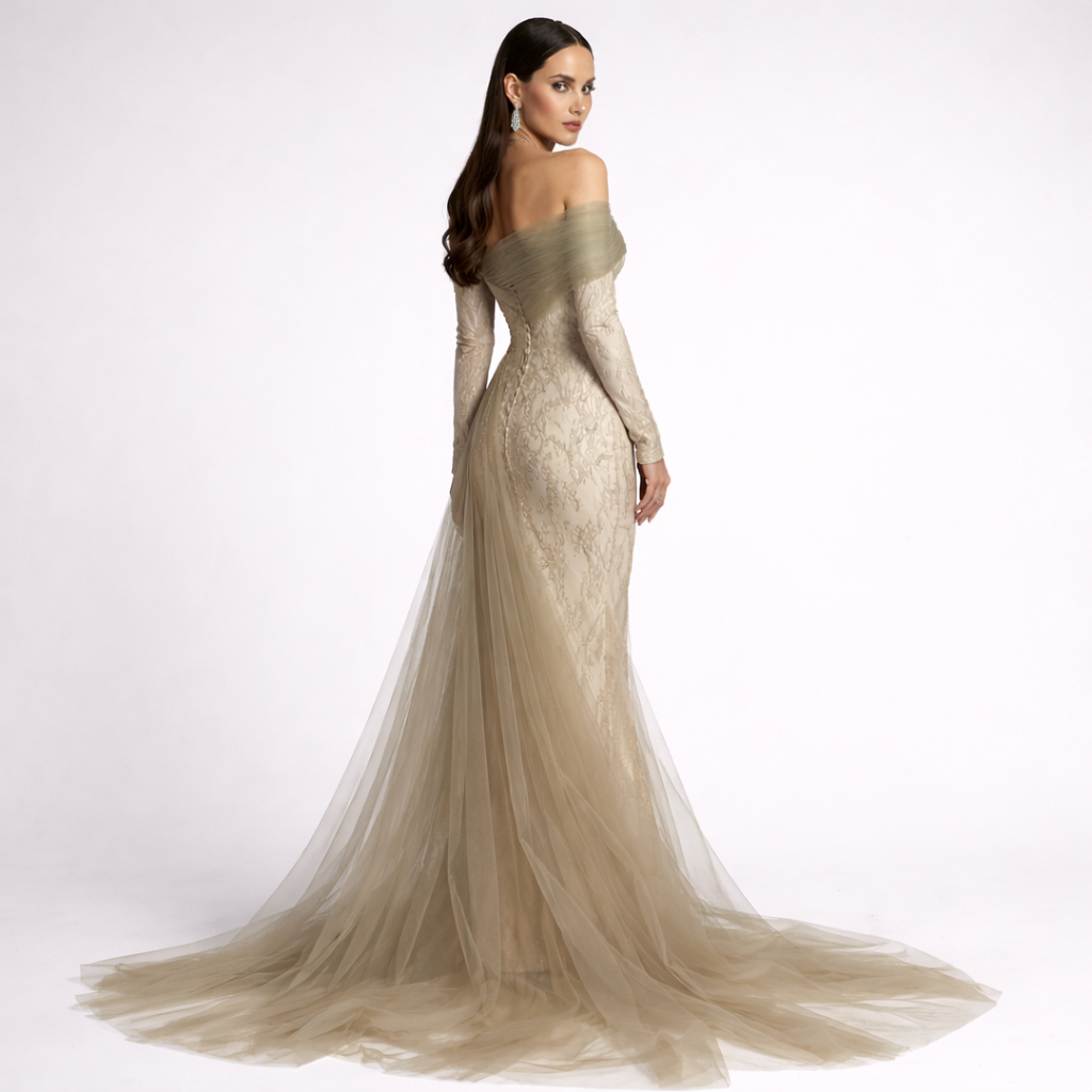 Woman wearing a beige off-shoulder gown with a long train on a white background