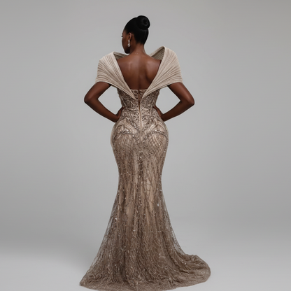 Woman wearing a sparkling evening gown with a plain background